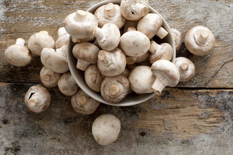 button mushrooms in a bowl