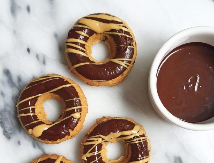 almond butter cup donuts with chocolate frosting