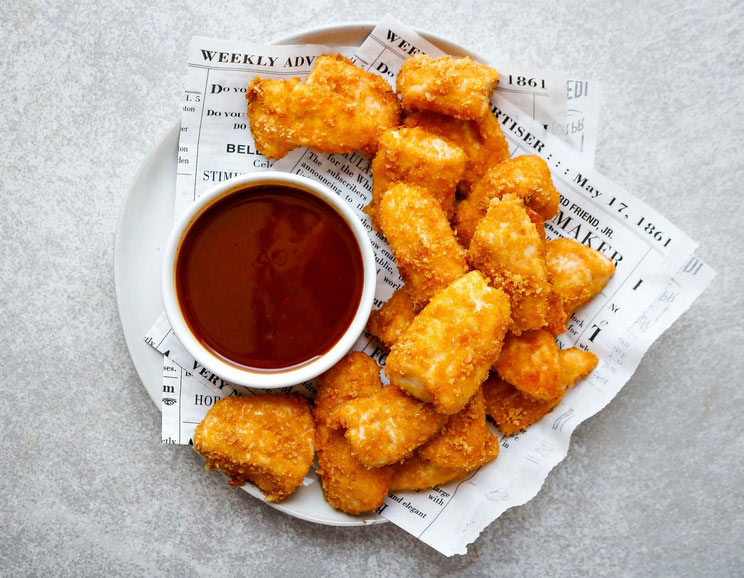 Bake up these Keto Chicken Nuggets Coated in Pork Rinds for a low-carb, gluten-free, and nut-free snack. Make as many batches as you want, we won't judge!