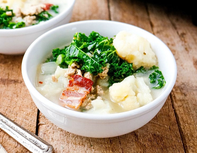 Indulge your creamy soup craving with this low-carb, dairy-free take on Zuppa Toscana. Let the slow cooker do all the work with this creamy, keto Italian soup recipe.