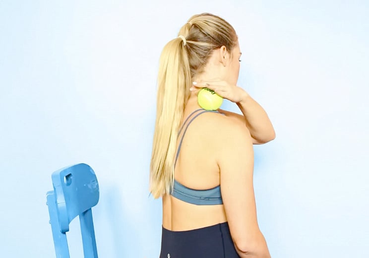 7 Tennis Ball Exercises to Soothe Stiff Muscles on Long Flights