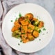 Roasted sweet potato gnocchi and caramelized Brussels sprouts come together in an elegant dish that’s surprisingly easy to make!